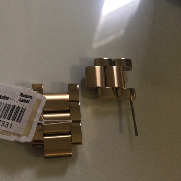MK gold watch